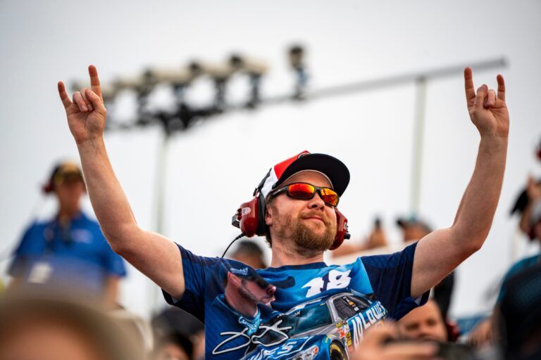 A fan cheers during the ARCA Menards Series Atlas Roofing 150 on Aug. 1, 2025, at Iowa Speedway in Newton, Iowa. Brenden Queen (28) finished first.