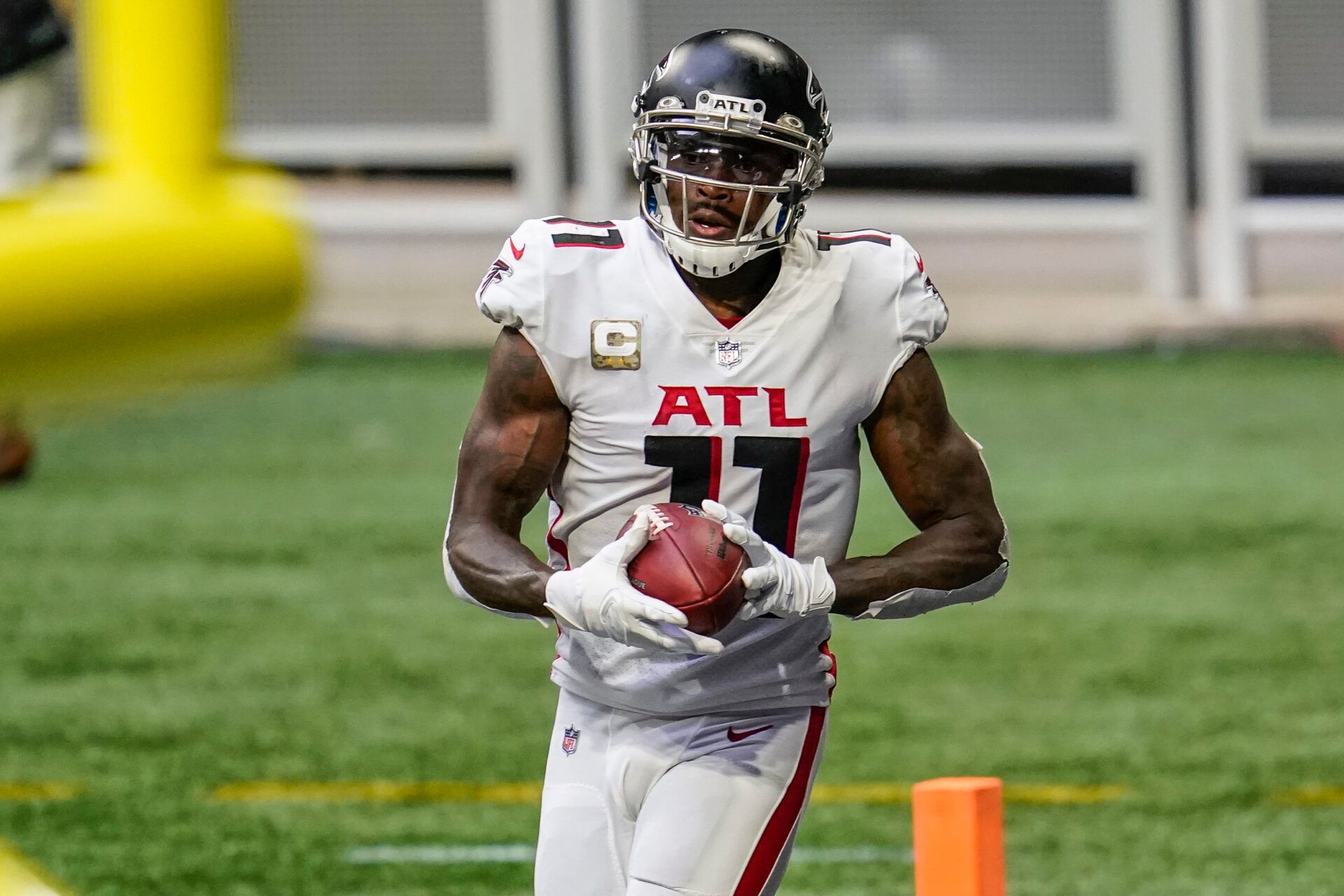 Atlanta Falcons wide receiver Julio Jones (11) catches a touchdown pass against the Denver Broncos  during the second half at Mercedes-Benz Stadium.