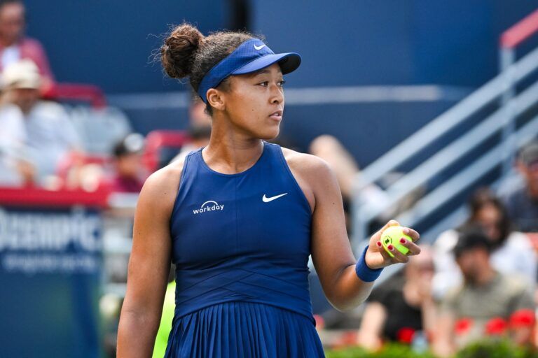 Naomi Osaka (JPN) gets ready to serve the ball to Jelena Ostapenko (LAT) in third round play at IGA Stadium.
