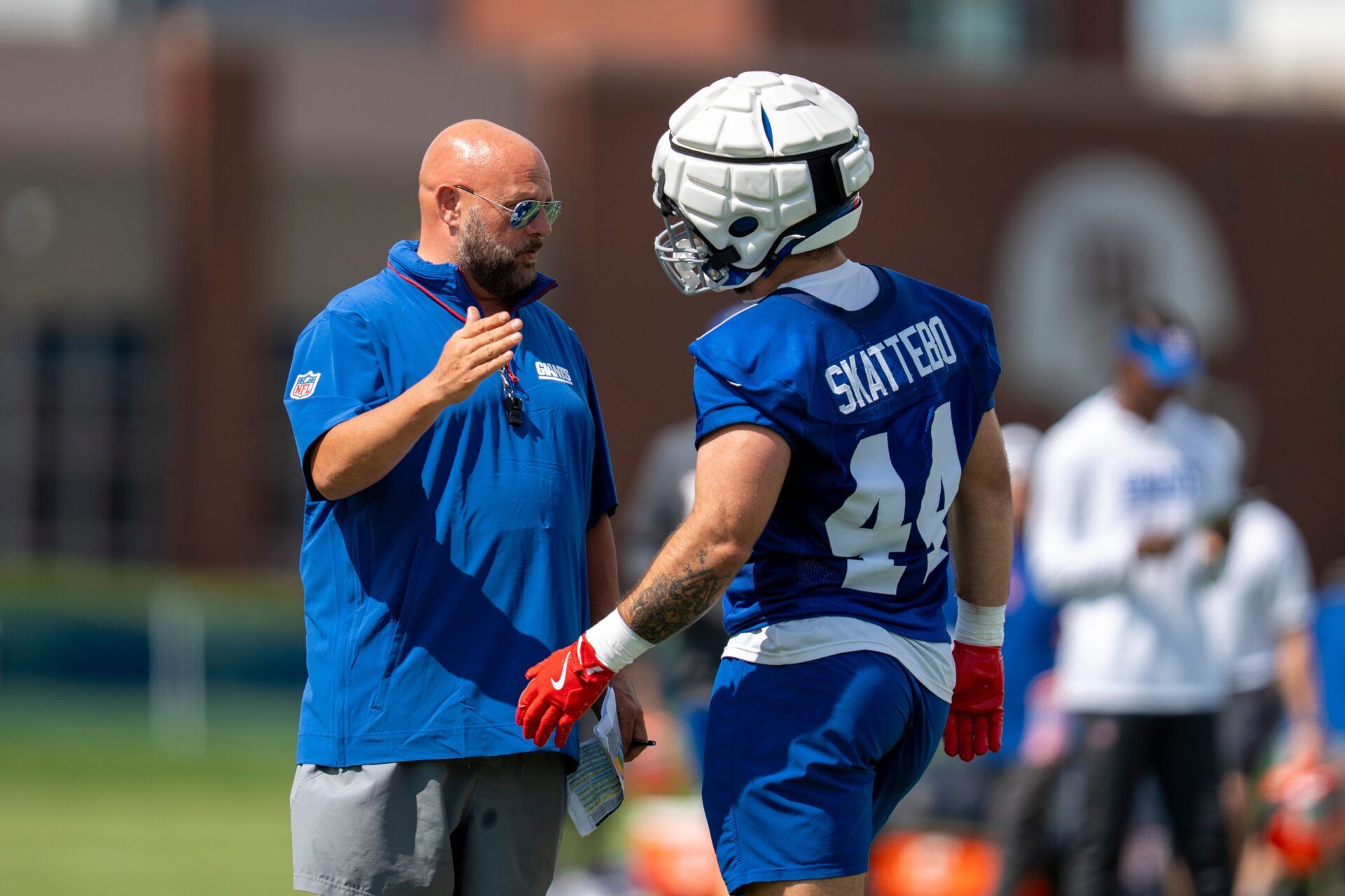 Cam Skattebo being carried off the field after injury