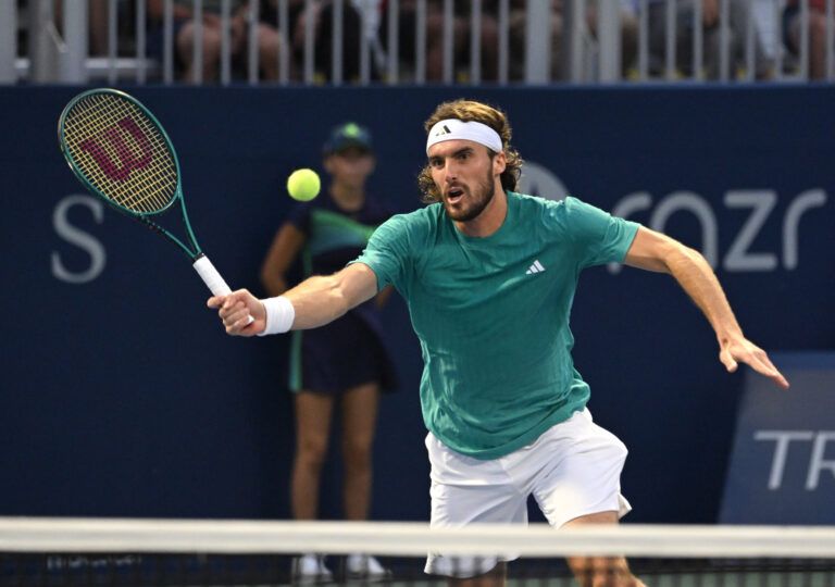 Stefanos Tsitsipas (GRE) plays a shot against Christopher O'Connell (AUS) during second round play at Sobeys Stadium.