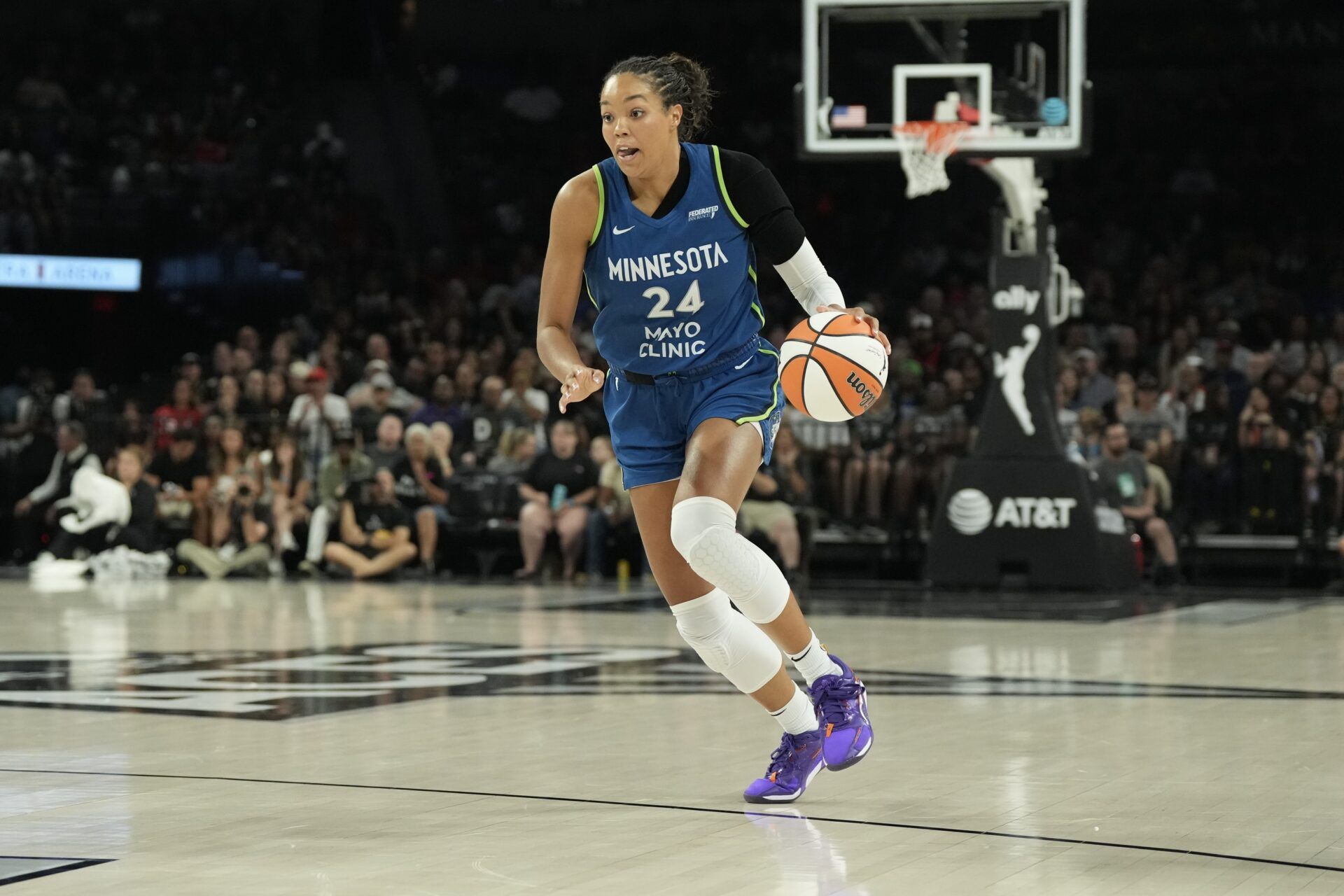 Minnesota Lynx forward Napheesa Collier (24) dribbles against the Las Vegas Aces during the first quarter at Michelob Ultra Arena.