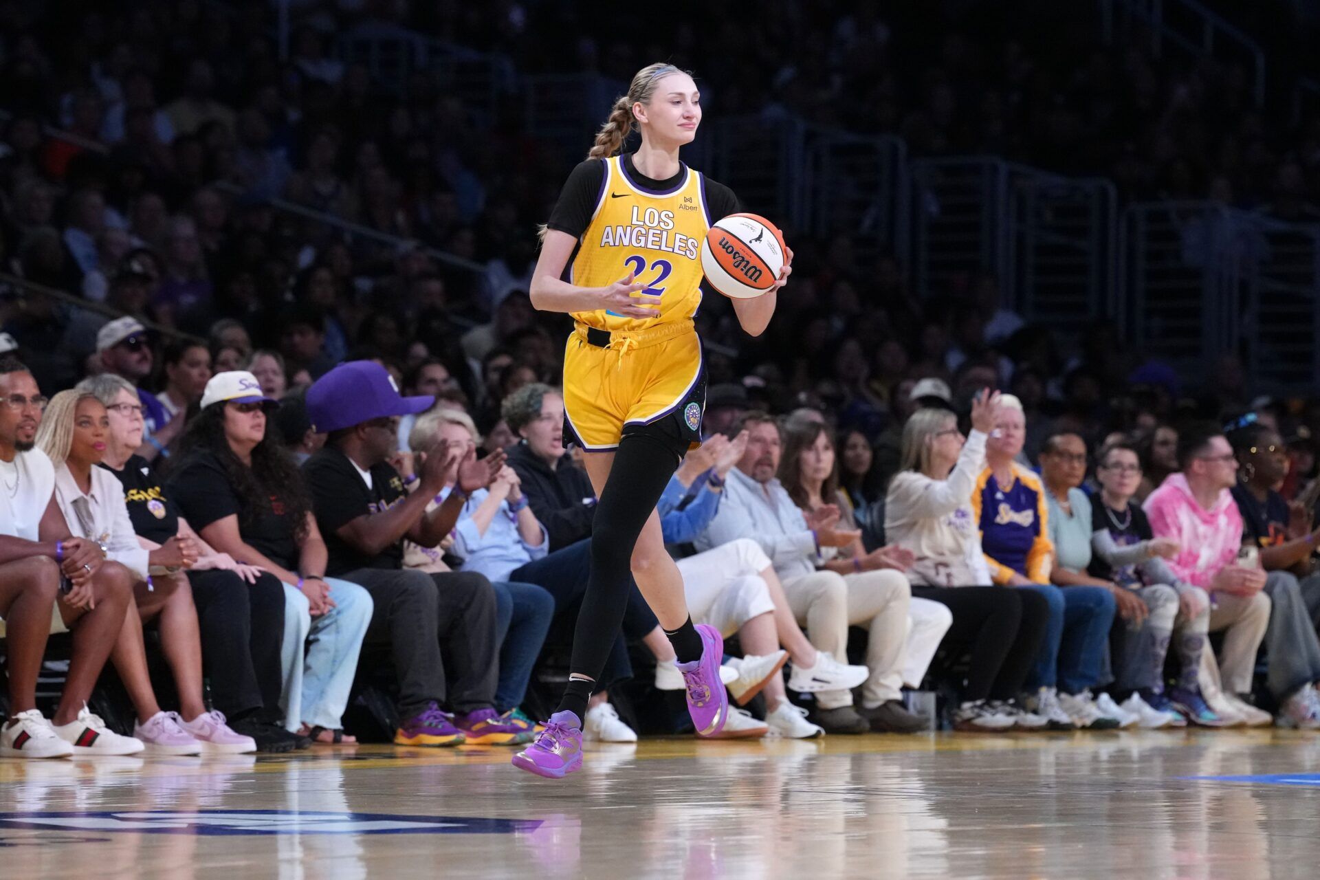 LA Sparks forward Cameron Brink (22) dribbles the ball against the Las Vegas Aces in the first half at Crypto.com Arena.