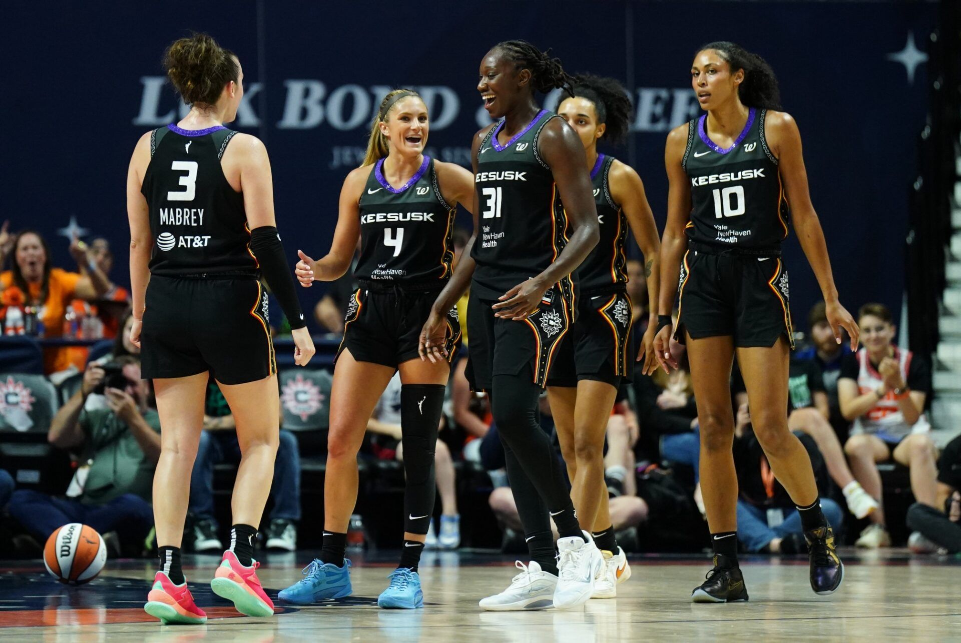 Connecticut Sun center Tina Charles (31) and teammates react after a play against the New York Liberty in the second half at Mohegan Sun Arena.
