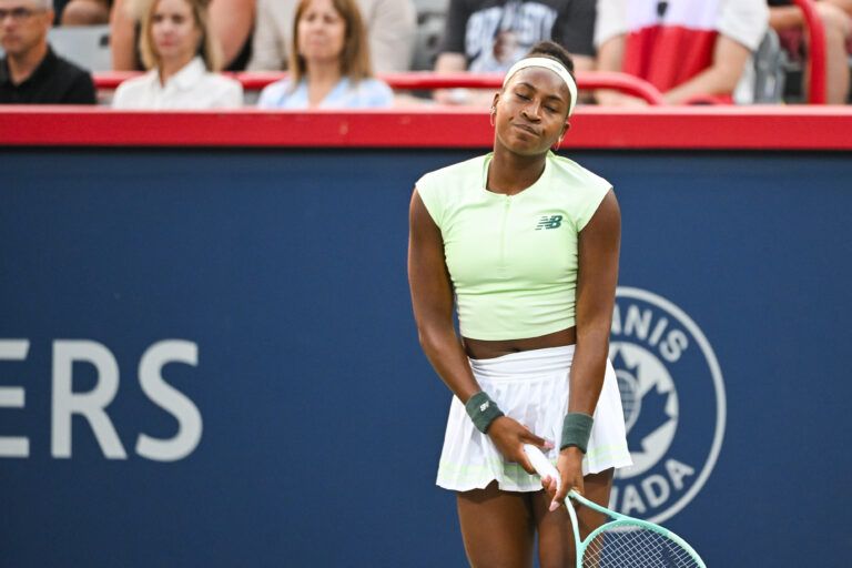 Coco Gauff (USA) reacts after a fault on a play against Victoria Mboko (CAN) in fourth round play at IGA Stadium.