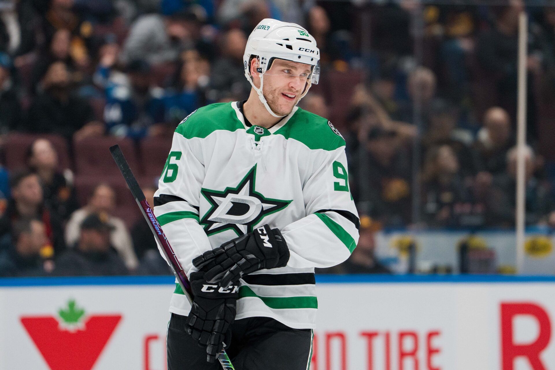 Dallas Stars forward Mikko Rantanen (96) smiles during a stop in play against the Vancouver Canucks in the first period at Rogers Arena.