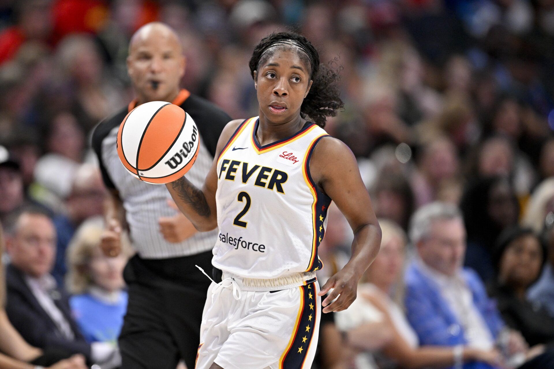 Indiana Fever guard Aari McDonald (2) brings the ball up court against the Dallas Wings during the second half at the American Airlines Center.