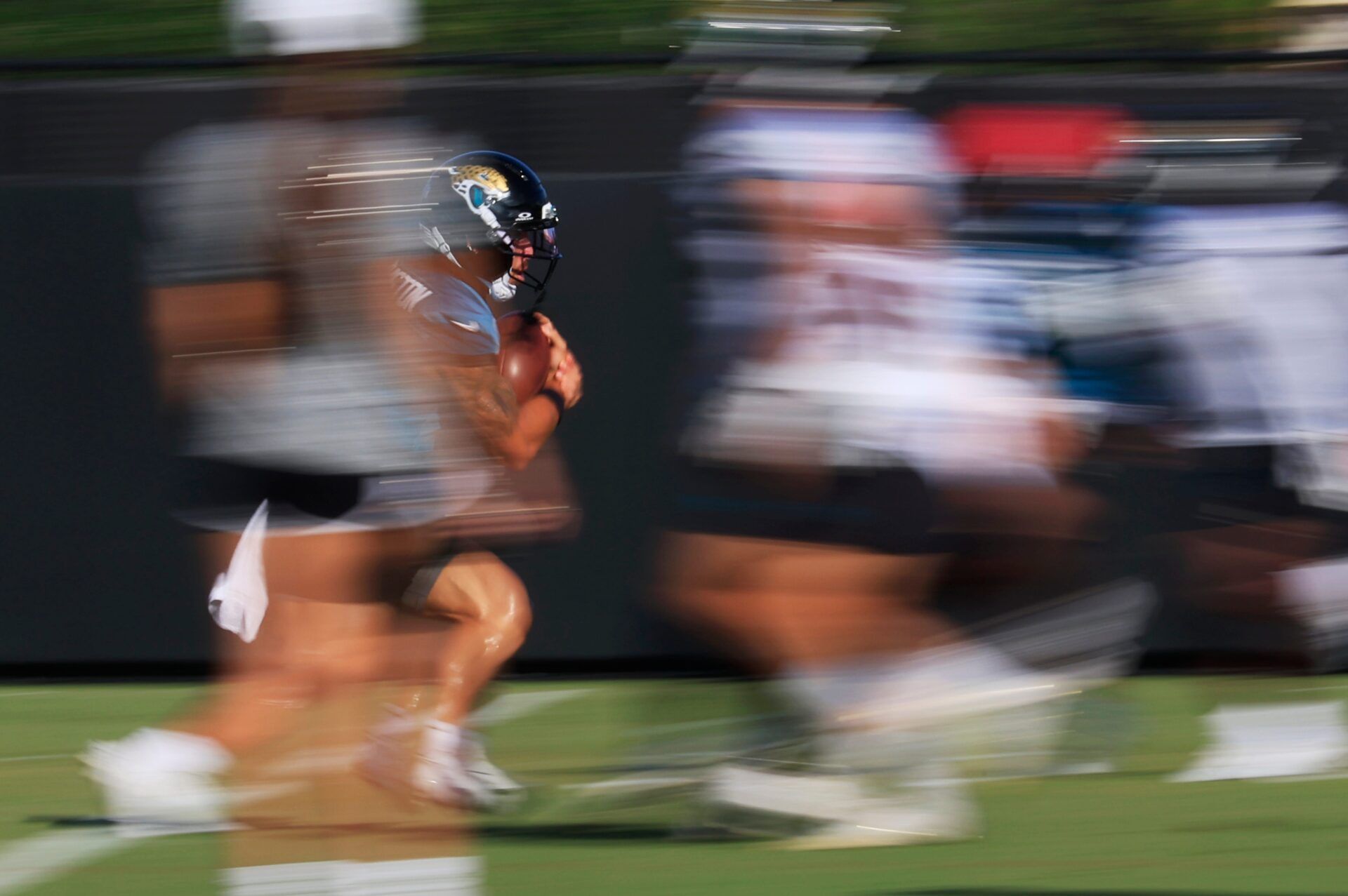 Jacksonville Jaguars wide receiver Parker Washington (11) runs the ball during an NFL training camp session at the Miller Electric Center, Sunday, Aug. 3, 2025, in Jacksonville, Fla. [Corey Perrine/Florida Times-Union]