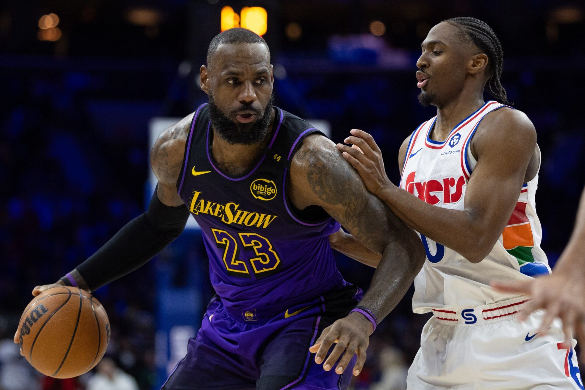 Los Angeles Lakers forward LeBron James (23) controls the ball against Philadelphia 76ers guard Tyrese Maxey (0) during the second quarter at Wells Fargo Center.