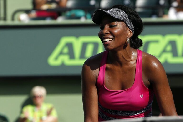 Venus Williams of the United States smiles after missing a shot against Patricia Maria Big of Romania (not pictured) on day six of the 2017 Miami Open at Crandon Park Tennis Center. Williams won 6-3, 6-0.