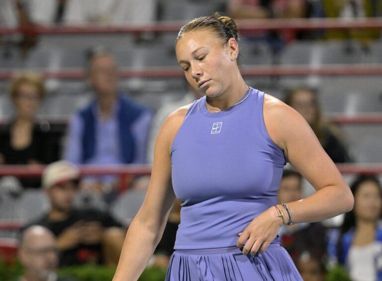 Amanda Anisimova (USA) reacts after a point against Emma Raducanu (GBR) in third round play at IGA Stadium.
