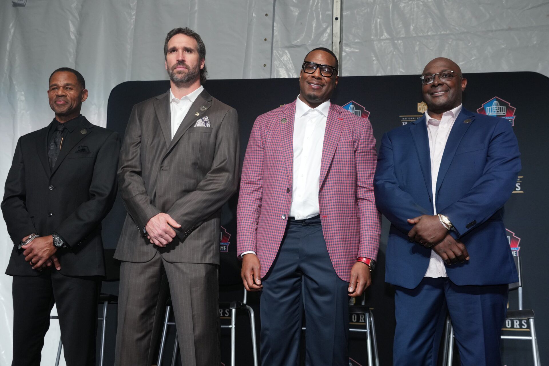 From left: Eric Allen, Jared Allen, Antonio Gates, and Sterling Sharpe pose during the Pro Football Hall of Fame Class of 2025 press conference at the Saenger Theater.