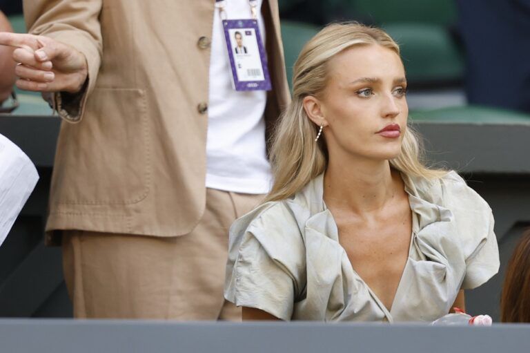 Morgan Riddle, girlfriend of Taylor Fritz (USA)(not pictured), sits in his player's box prior to the match against Carlos Alcaraz (ESP)(not pictured) in a gentlemen's singles semi-final on day twelve of The Championships Wimbledon 2025 at All England Lawn Tennis and Croquet Club.