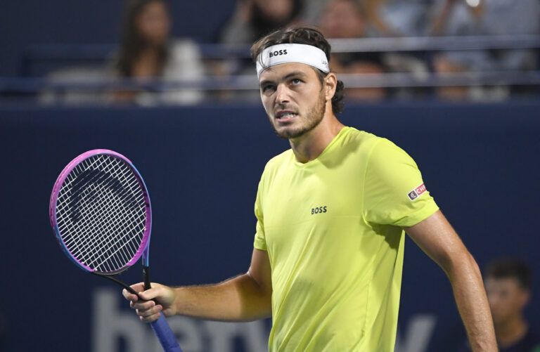 Taylor Fritz (USA) reacts after winning the first set against Jiri Lehecka (CZE) during fourth round play at Sobeys Stadium.