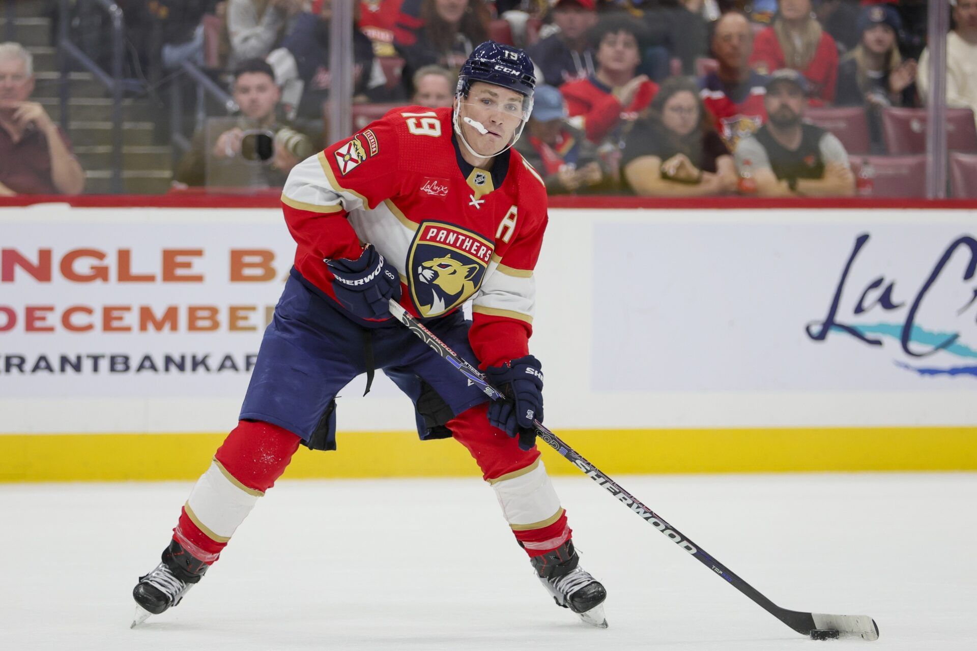 Florida Panthers left wing Matthew Tkachuk (19) moves the puck against the Columbus Blue Jackets during the second period at Amerant Bank Arena.