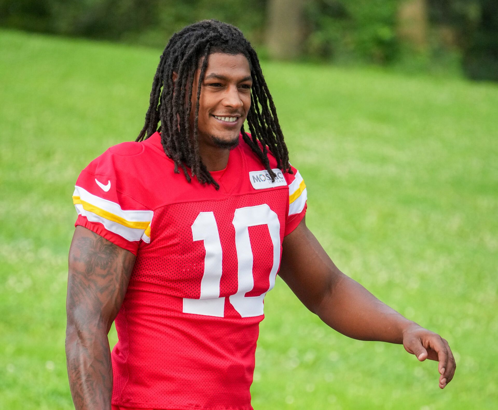 Kansas City Chiefs running back Isiah Pacheco (10) walks down the hill to the practice fields during training camp at Missouri Western State University.