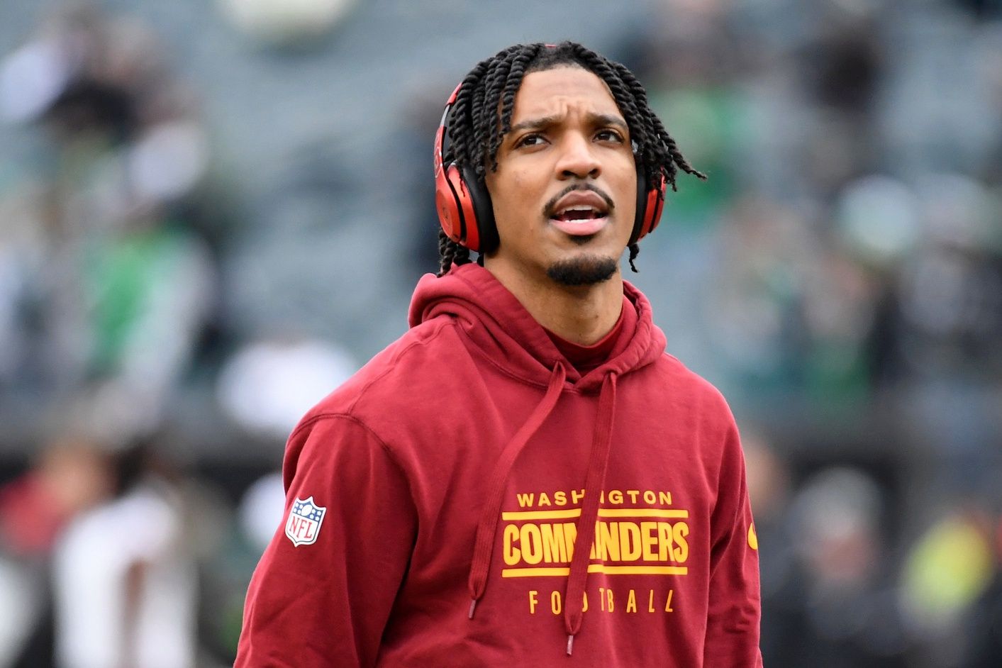 Washington Commanders quarterback Jayden Daniels (5) looks on before the NFC Championship game at Lincoln Financial Field.