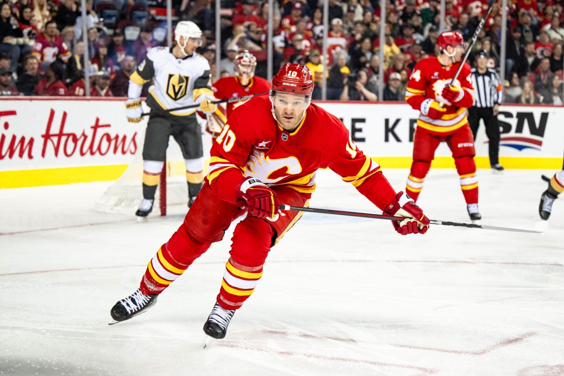 Calgary Flames center Jonathan Huberdeau (10) skates against the Vegas Golden Knights during the third period at Scotiabank Saddledome.