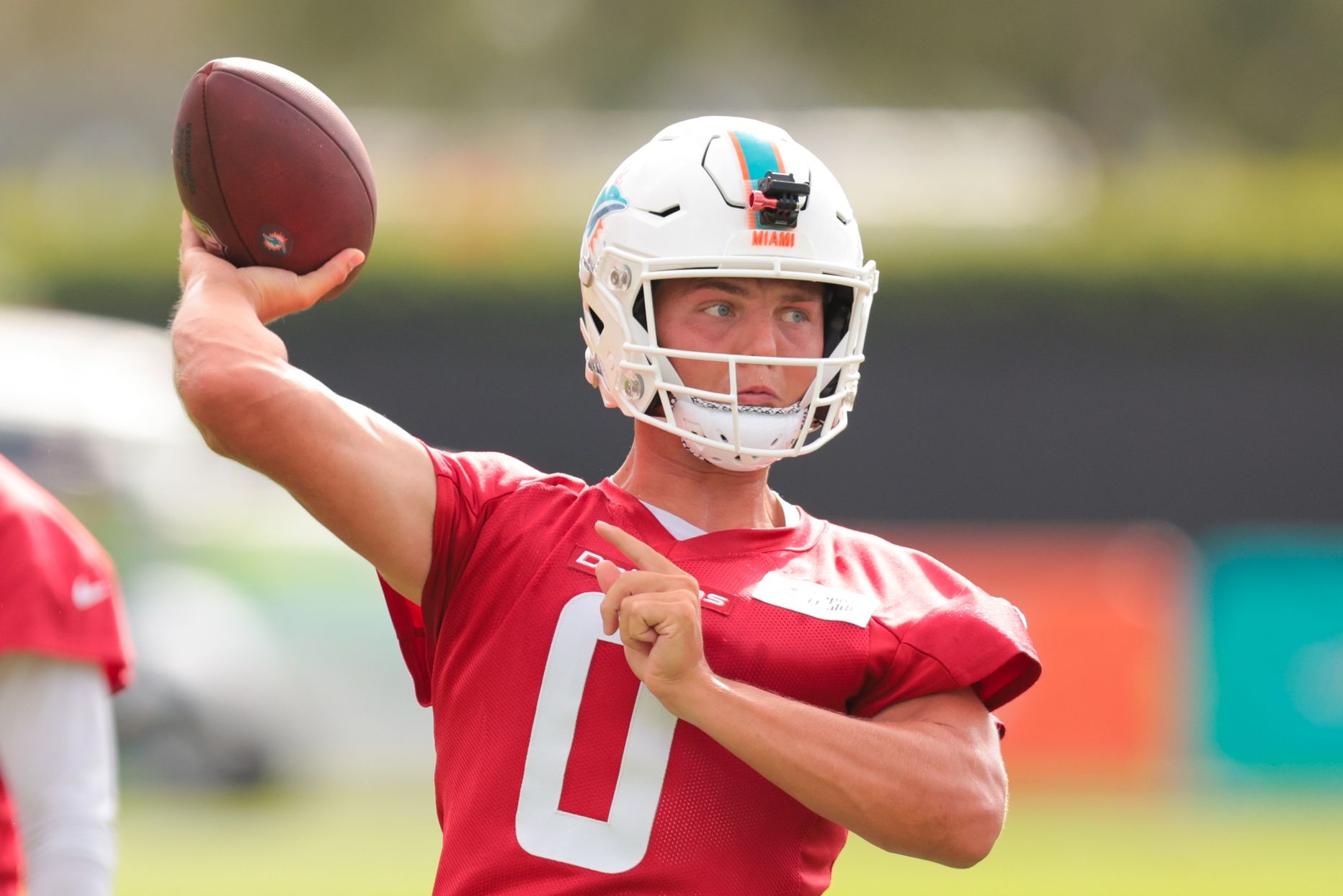 Miami Dolphins quarterback Zach Wilson (0) throws the football during training camp at Baptist Health Training Complex.