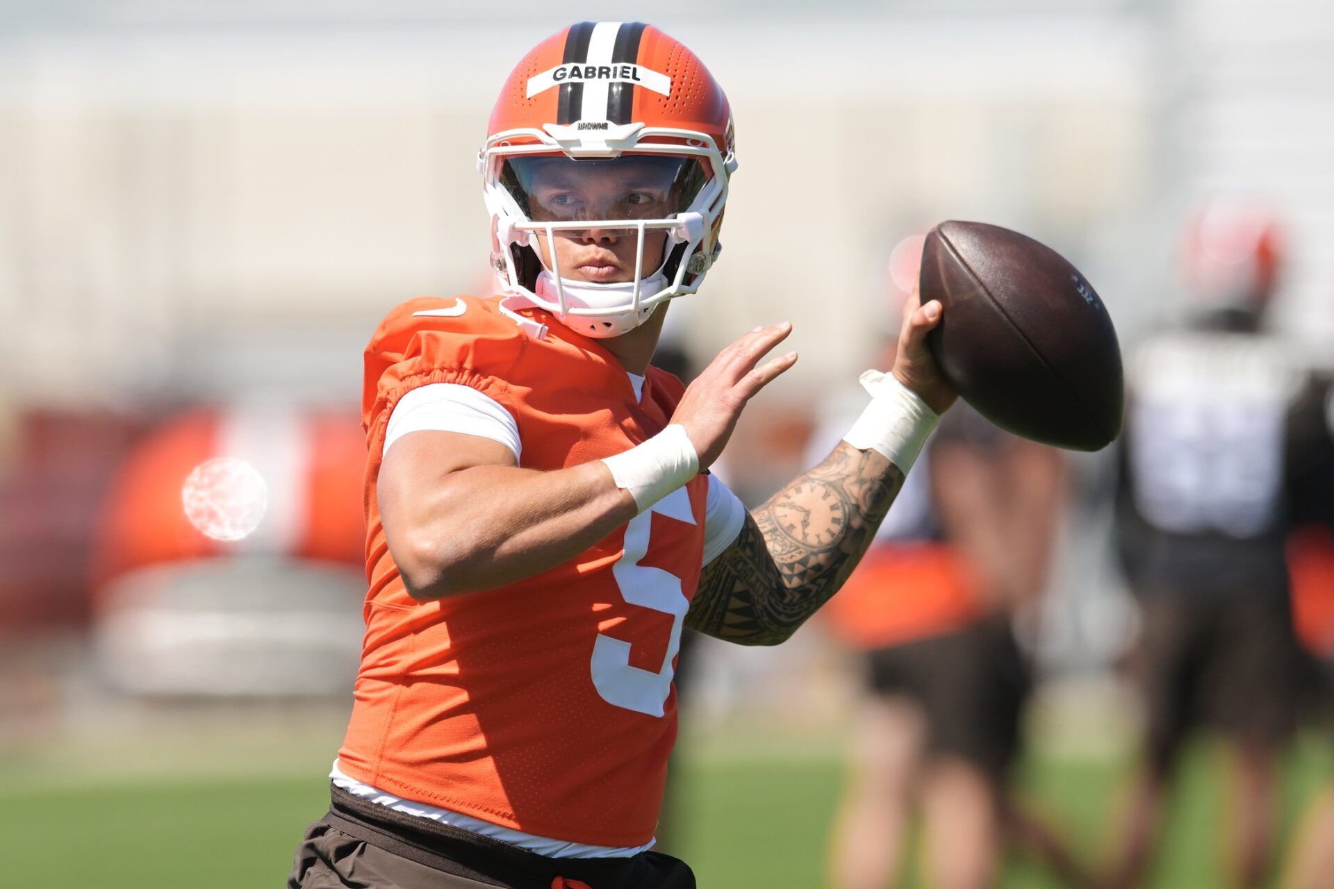 Cleveland Browns quarterback Dillon Gabriel (5) throws a pass during rookie minicamp at CrossCountry Mortgage Campus.