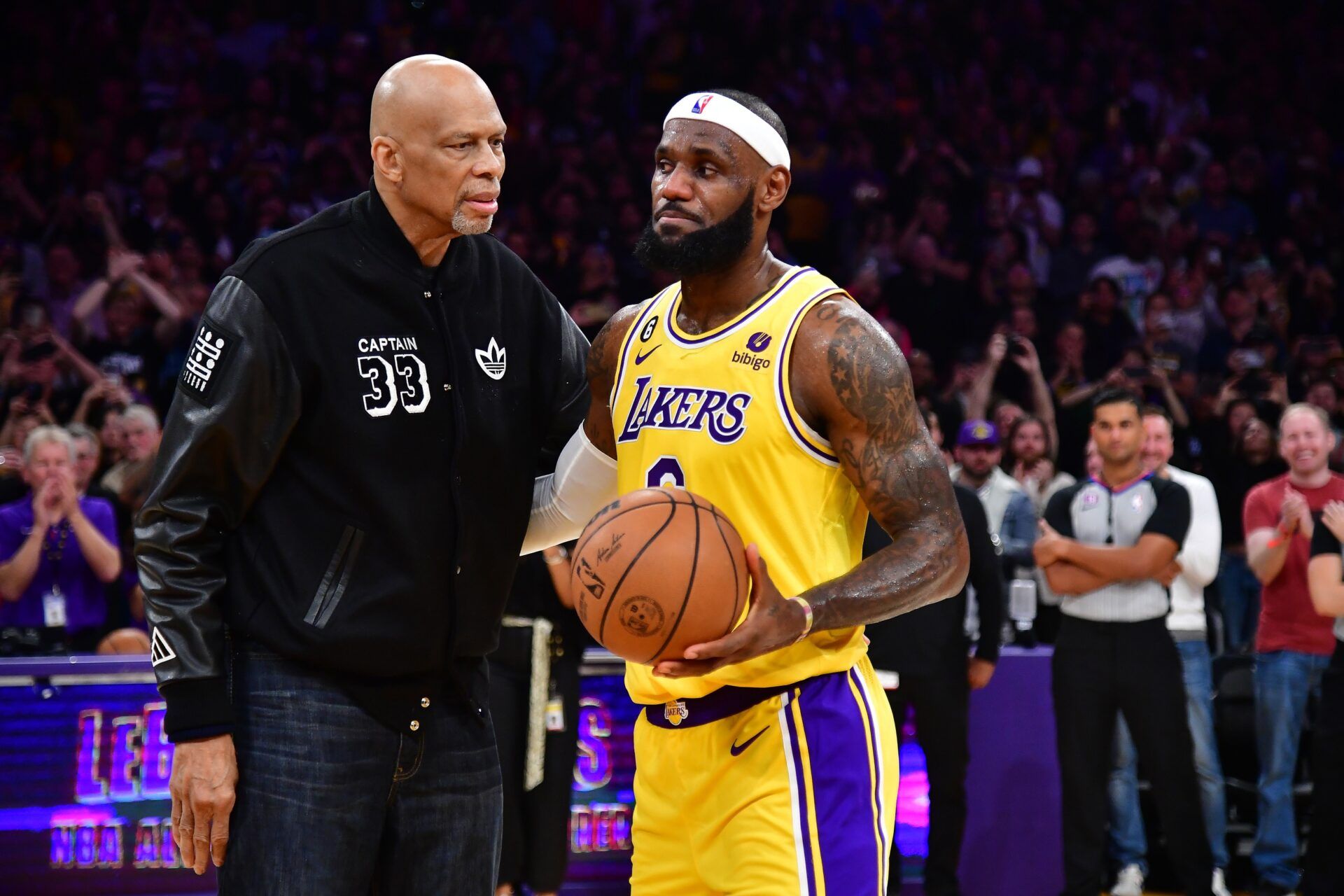 Los Angeles Lakers forward LeBron James (6) meets with former player Kareem Abdul-Jabbar after breaking the NBA all time scoring record against the Oklahoma City Thunder during the second half at Crypto.com Arena.