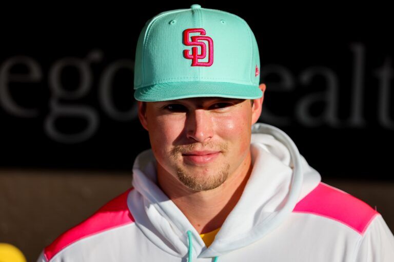 San Diego Padres pitcher Mason Miller (22) looks on from the dugout before the game against the St. Louis Cardinals at Petco Park.