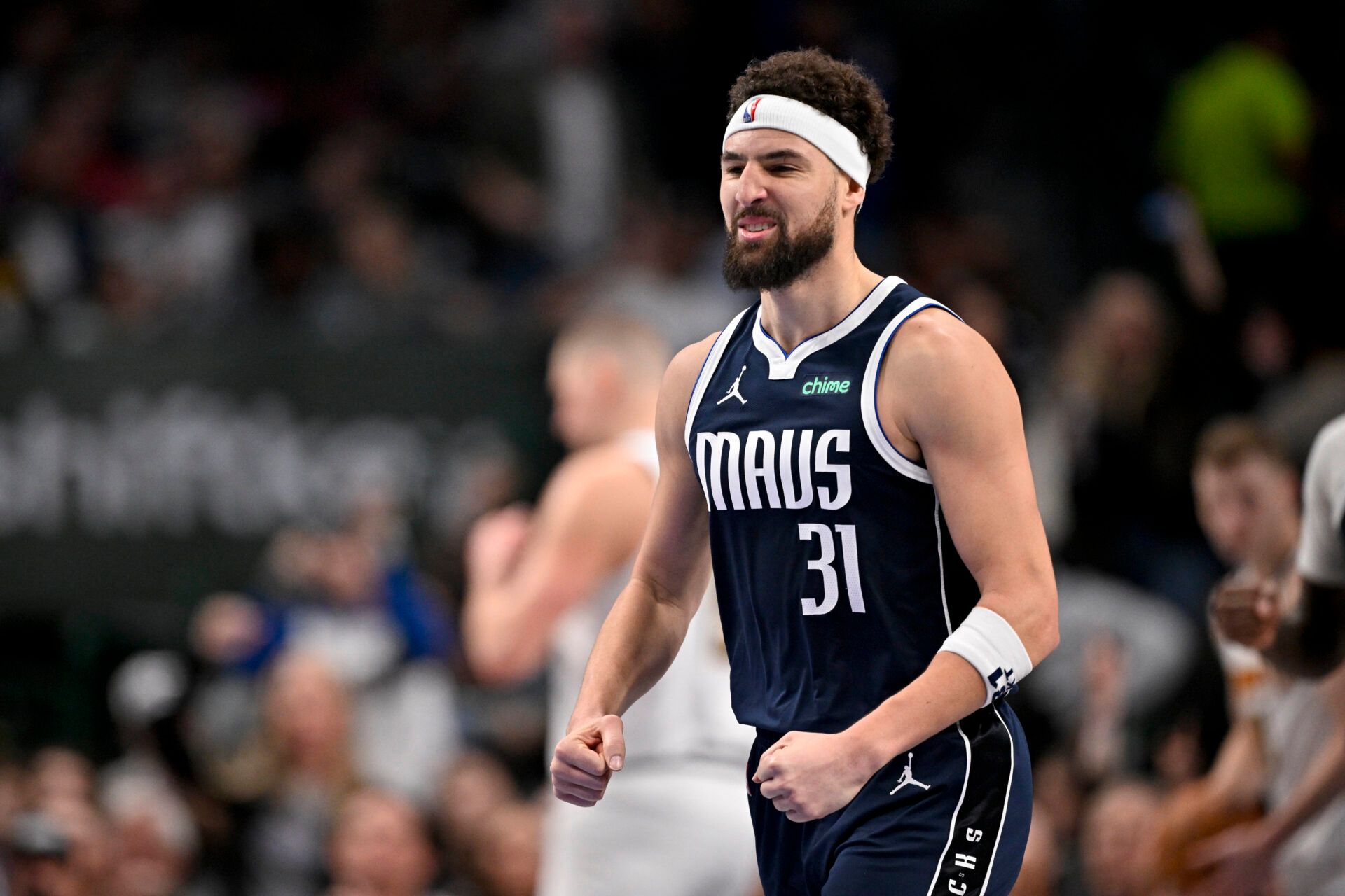 Dallas Mavericks guard Klay Thompson (31) celebrates after he makes a three point basket against the Denver Nuggets during the second half at the American Airlines Center.