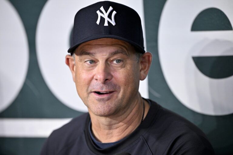 New York Yankees manager Aaron Boone (17) speaks to the media before the game against the Texas Rangers at Globe Life Field.