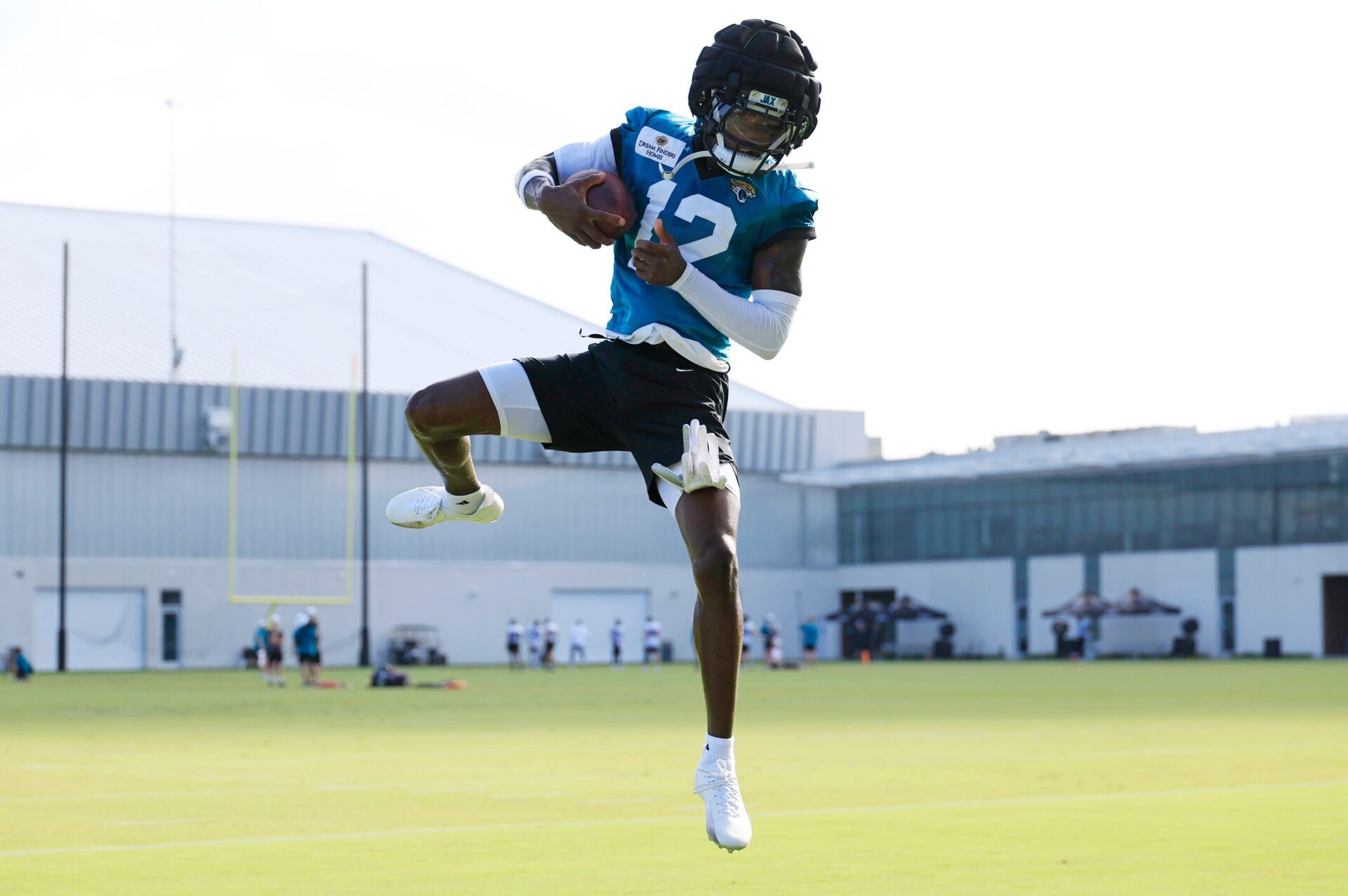 Jacksonville Jaguars wide receiver Travis Hunter (12) catches a pass during an NFL training camp session at the Miller Electric Center, Sunday, Aug. 3, 2025, in Jacksonville, Fla. [Corey Perrine/Florida Times-Union]