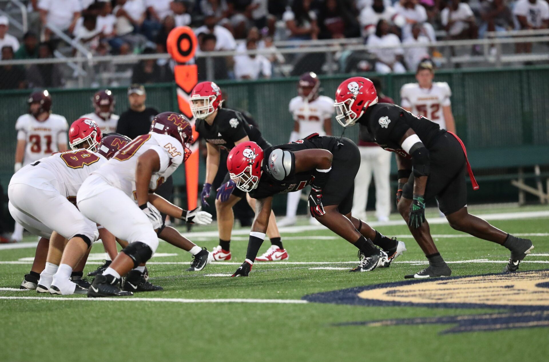 Savannah Christian's Elijah Griffin and LaDamion Guyton prepare for the snap on Friday, August 23, 2024 at Pooler Stadium.
