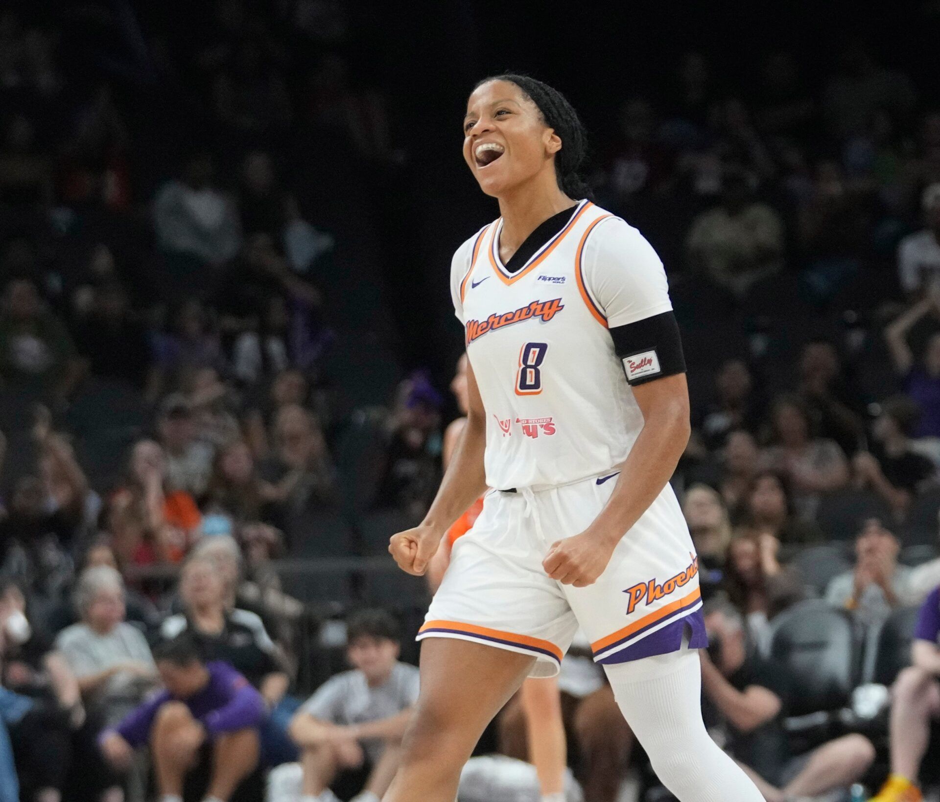 Phoenix Mercury guard Monique Akoa Makani (8) celebrates a three point basket against the Connecticut Sun during the third quarter in Phoenix, at PHX Arena on Aug 5, 2025. IMAGN