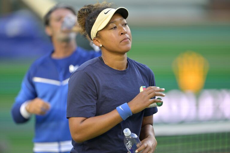 Naomi Osaka (JPN) practices on the first day of the BNP Paribas with her coach Patrick Mouratoglou at the Indian Well Tennis Garden.