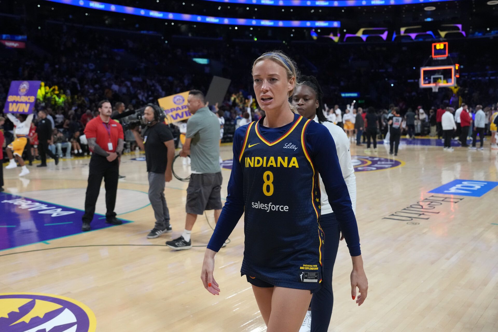 Indiana Fever guard Sophie Cunningham (8) leaves the court after the game against the LA Sparks at the Crypto.com Arena.