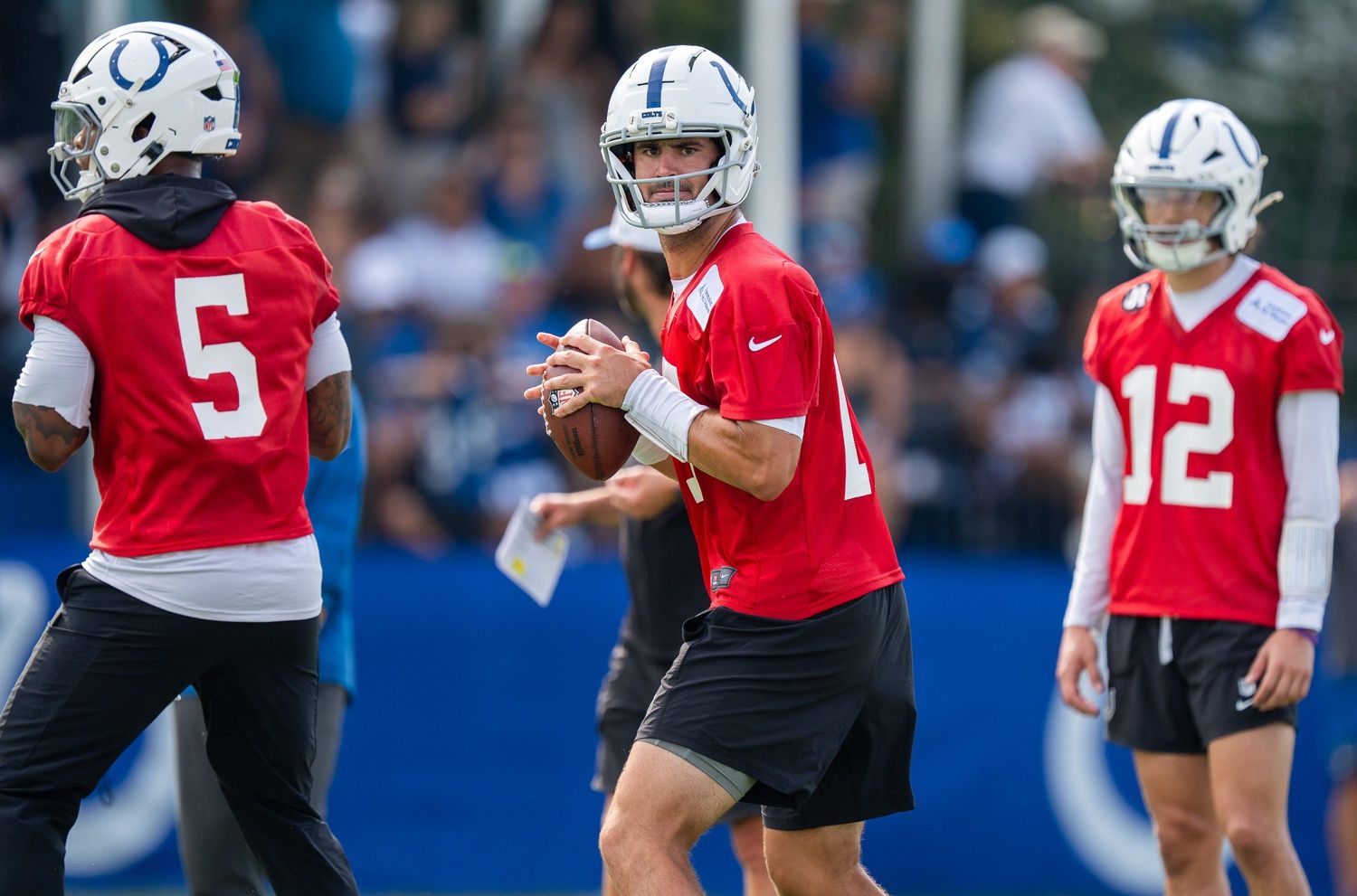 Indianapolis Colts quarterback Daniel Jones (17) looks to pass Friday, July 25, 2025, during training camp held at Grand Park in Westfield.