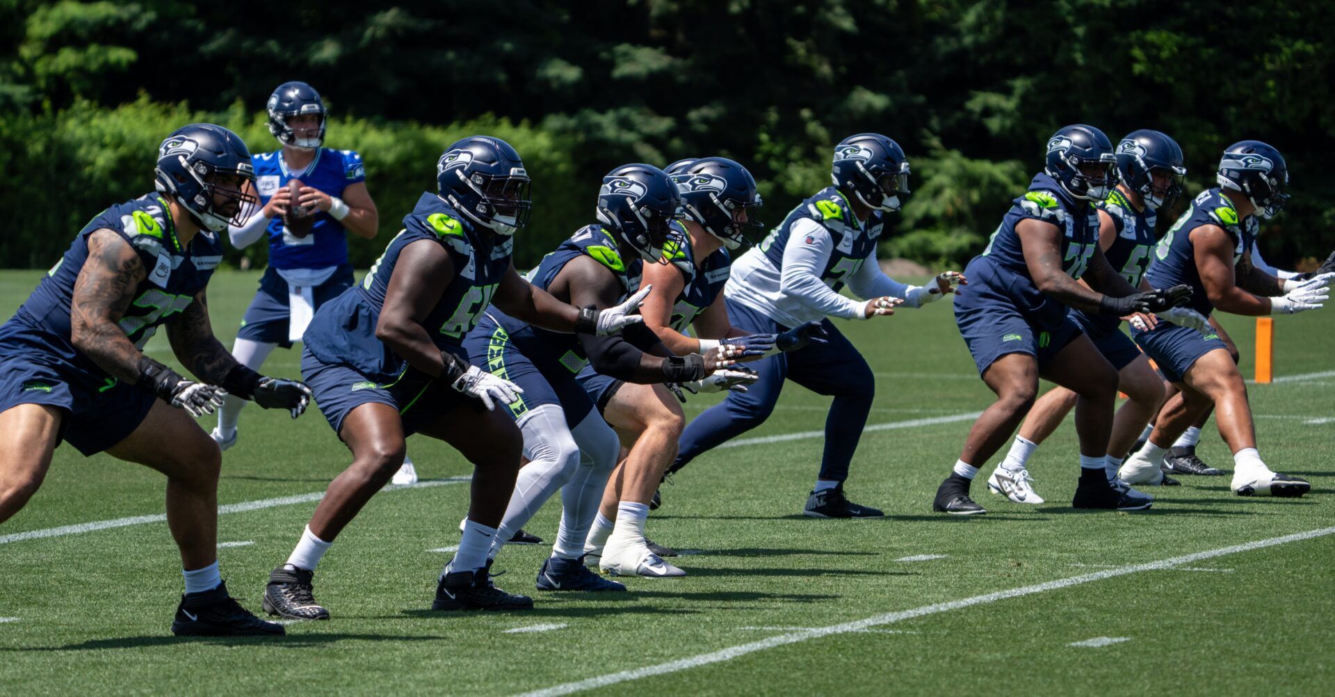 Seattle Seahawks offensive line units take part in drills during mini-camp at Virginia Mason Athletic Center.