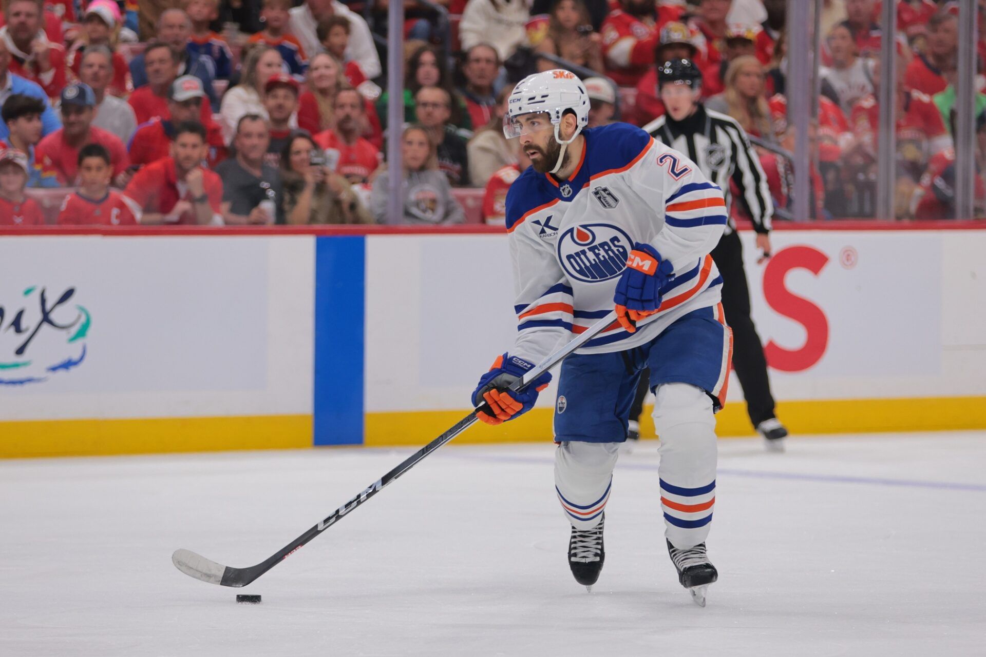 Edmonton Oilers defenseman Evan Bouchard (2) controls the puck during the first period against the Florida Panthers in game three of the 2025 Stanley Cup Final at Amerant Bank Arena.