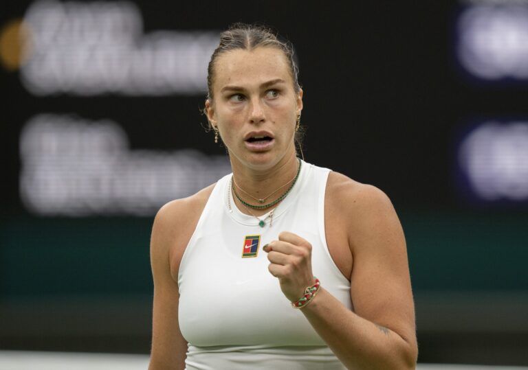 Aryna Sabalenka reacts to a point during her match against Elise Mertens of Belgium on day seven at the All England Lawn Tennis and Croquet Club.