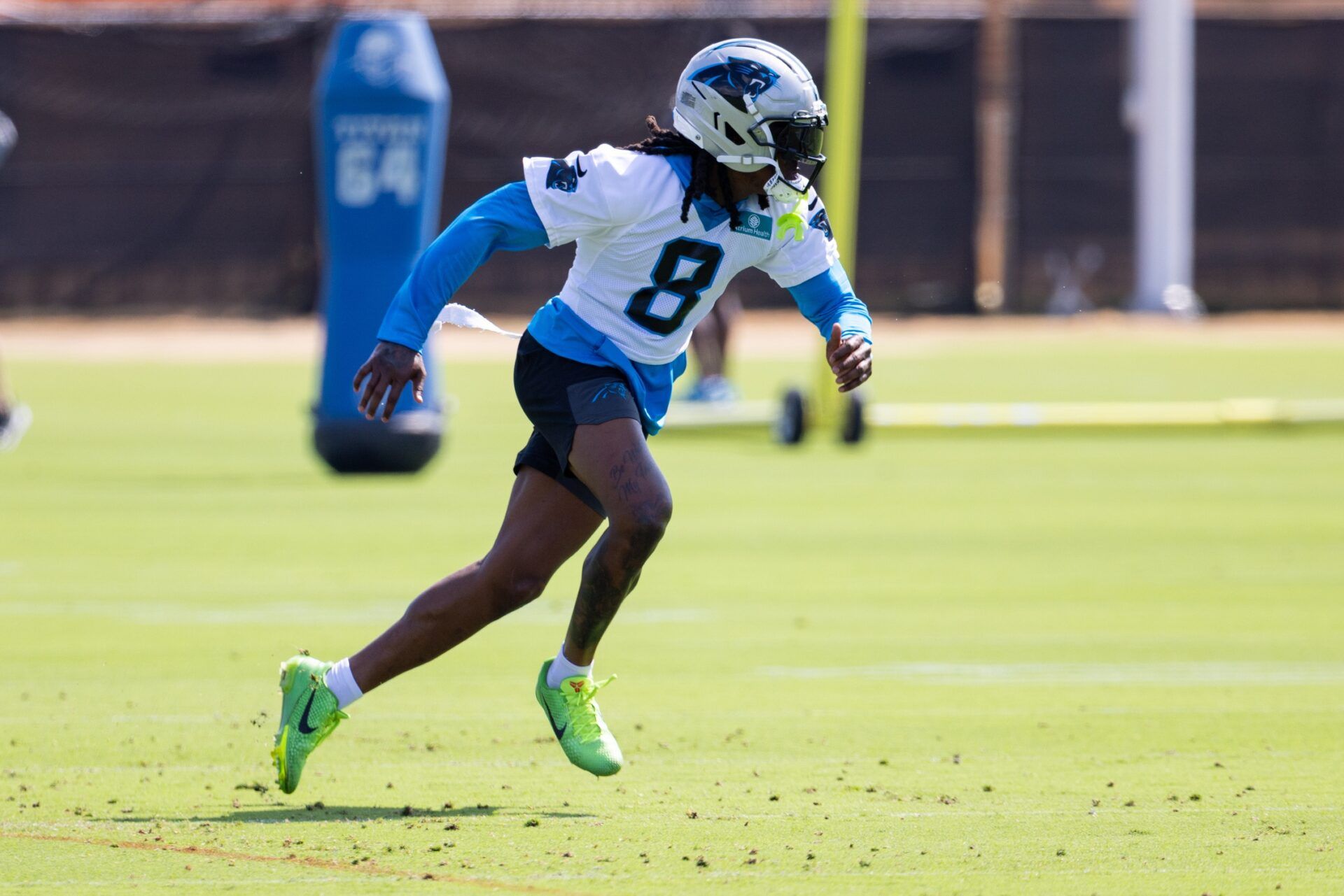 Carolina Panthers cornerback Jaycee Horn (8) runs drills during training camp.