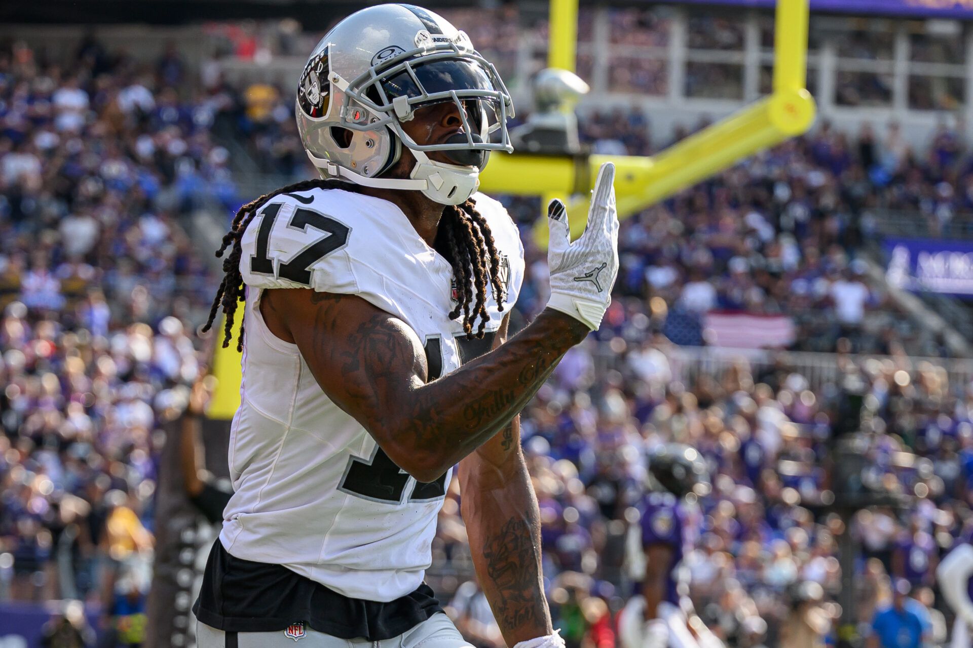 Las Vegas Raiders wide receiver Davante Adams (17) celebrates after scoring a touchdown during the second half against the Baltimore Ravens at M&T Bank Stadium.