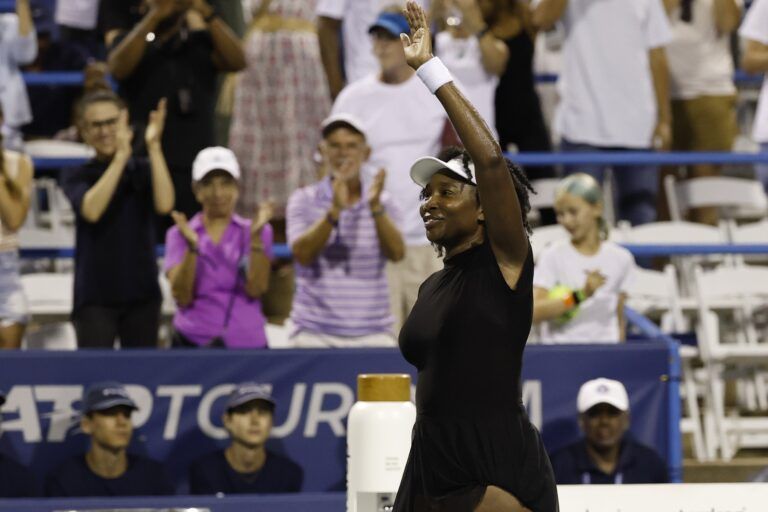 Venus Williams (USA) waves to the crowd after her match against Magdalena Frech (POL)(not pictured) in a women's singles match on day four of the Mubadala Citi DC Open at Rock Creek Park Tennis Center.