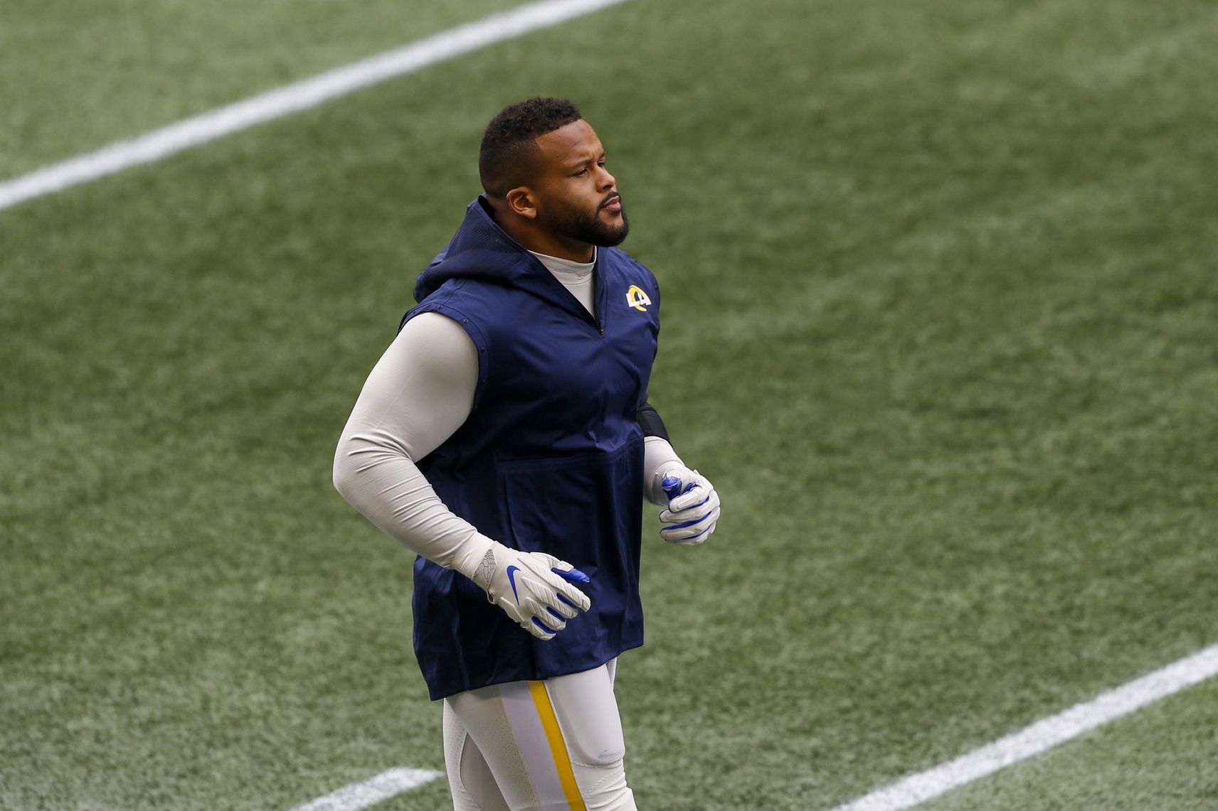 Los Angeles Rams defensive end Aaron Donald (99) warms up before the game against the Seattle Seahawks at Lumen Field.