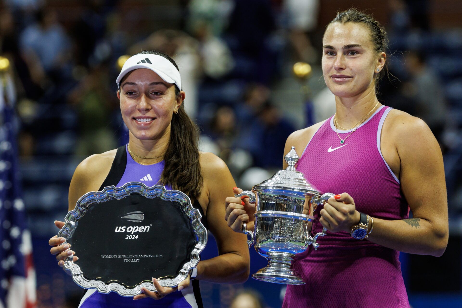 Aryna Sabalenka of Belarus and Jessica Pegula of the United States pose with their trophies after the final of the women’s singles on day thirteen of the U.S. Open tennis tournament at the USTA Billie Jean King National Tennis Center.