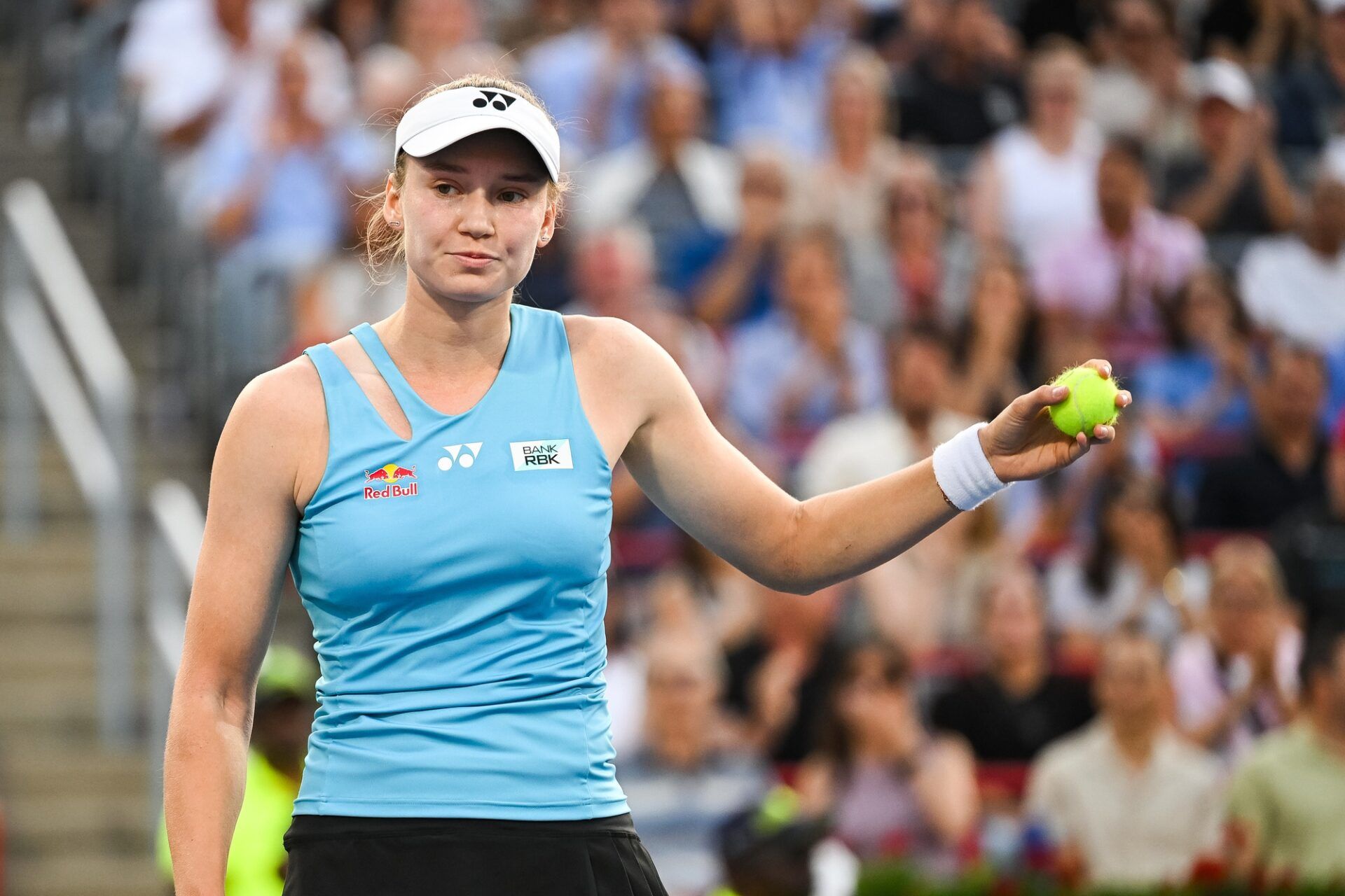 Elena Rybakina (KAZ) reacts while grabbing a ball after a bad play against Victoria Mboko (CAN) in semifinal play at IGA Stadium.