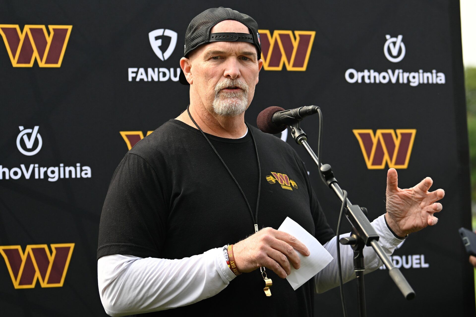 Washington Commanders head coach Dan Quinn holds a press conference before training camp at Gillette Stadium.