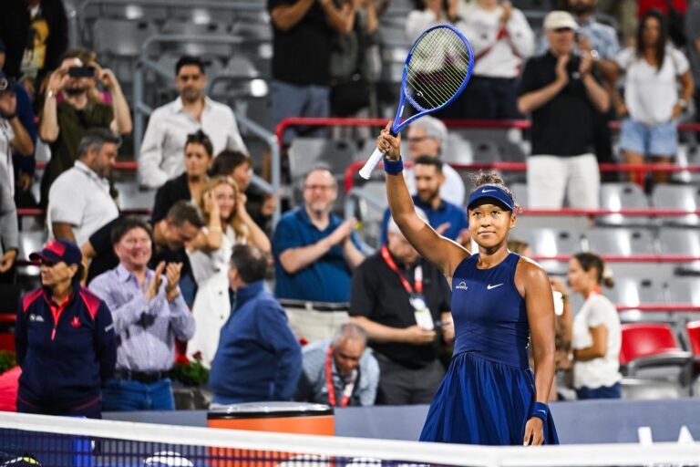 Naomi Osaka (JPN) salutes the crowd after her semifinal win against Clara Tauson (DEN) at IGA Stadium.