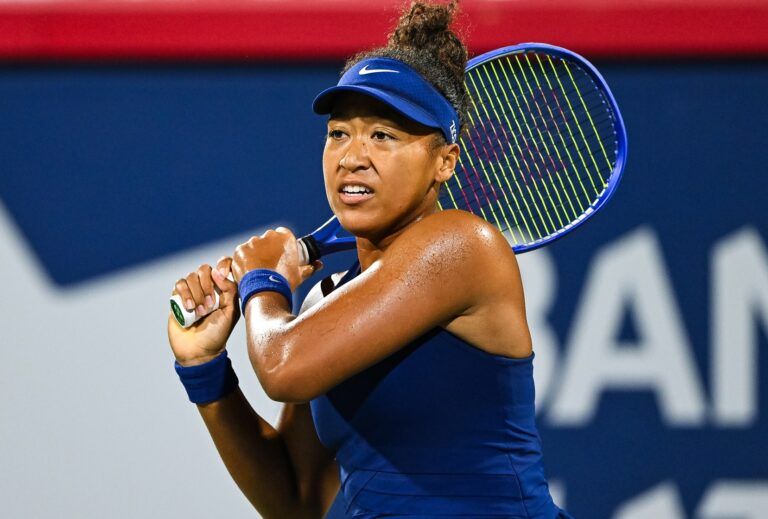 Naomi Osaka (JPN) tracks her shot to Clara Tauson (DEN) in semifinal play at IGA Stadium.