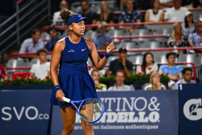 Naomi Osaka (JPN) reacts after scoring a point against Clara Tauson (DEN) in semifinal play at IGA Stadium.