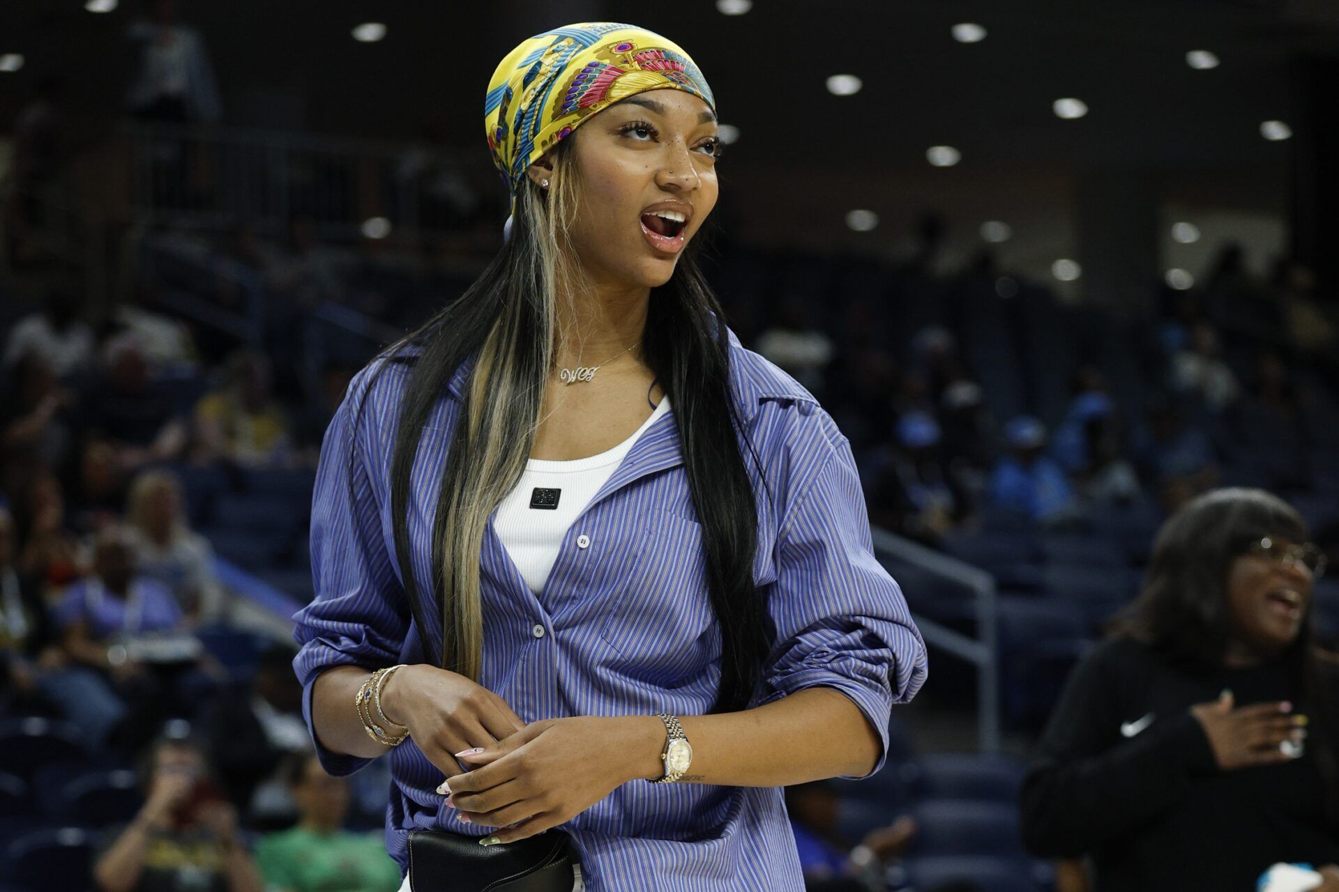 Injured Chicago Sky forward Angel Reese (5) stands on the court before a WNBA game against the Washington Mystics at Wintrust Arena.