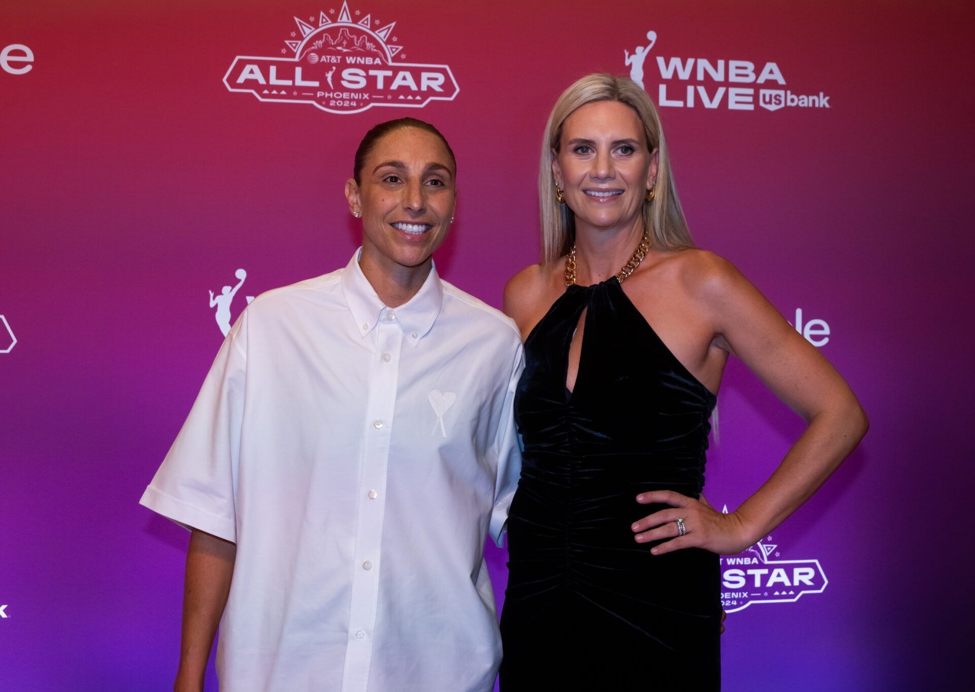 Phoenix Mercury player Diana Taurasi (left) and wife Penny Taylor walk the red carpet during the WNBA All Star weekend at the Phoenix Convention Center.