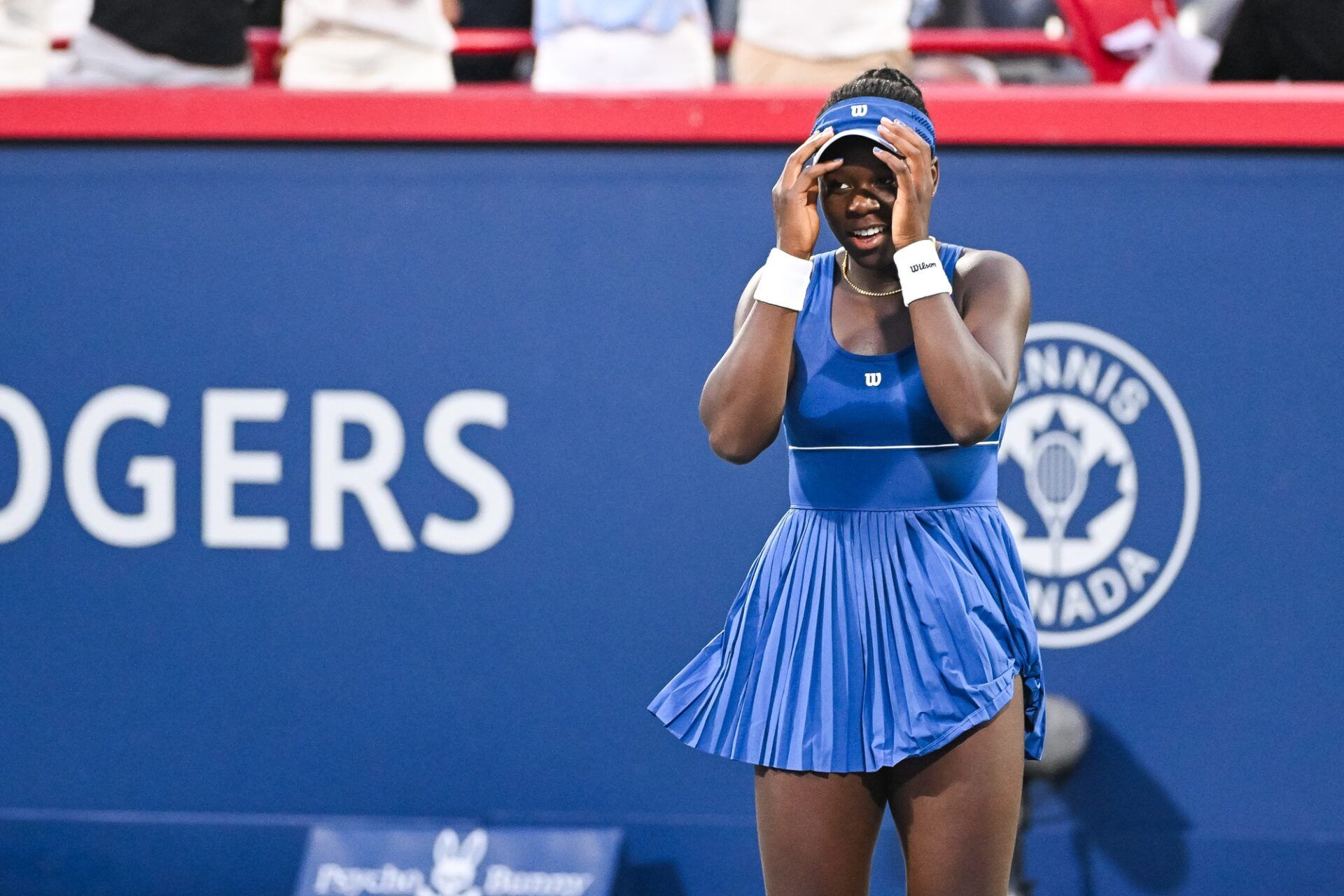 Victoria Mboko (CAN) reacts after winning her fourth round match against Coco Gauff (USA) at IGA Stadium.